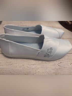 Toms Women's White Slip-On Flats with Script Embroidery